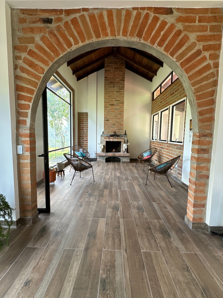 Living room seating with mountain light
